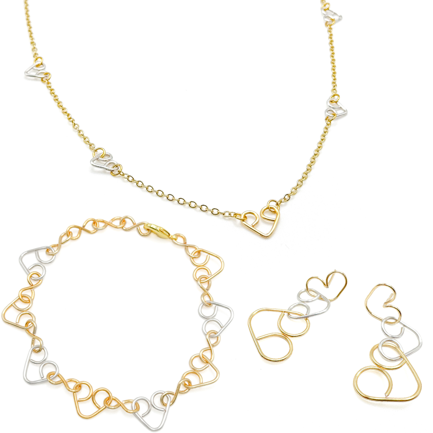 Intertwined gold and silver two-tone heart necklace
